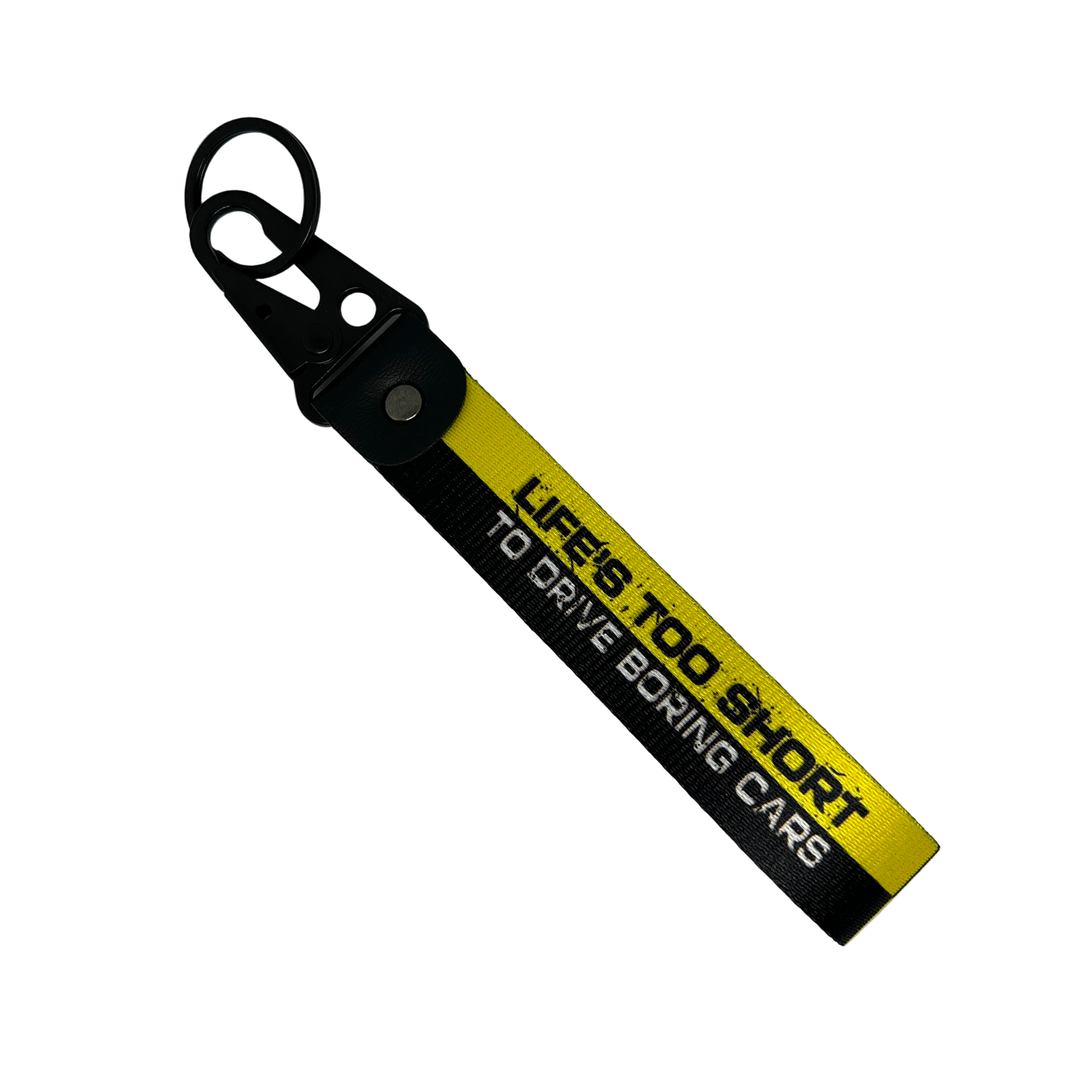 Black and yellow key tag with "Life's too short to drive boring cars" text – Motorev JDM car accessory