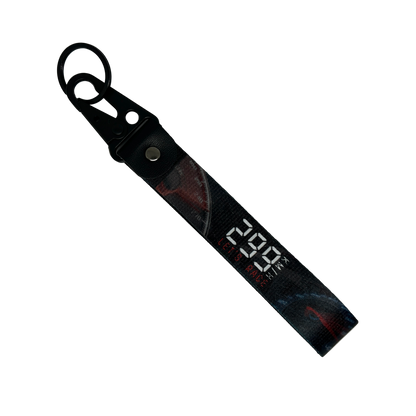 Black 299 KM/H Let’s Race key tag with a speedometer design – Motorev JDM performance car keychain accessory