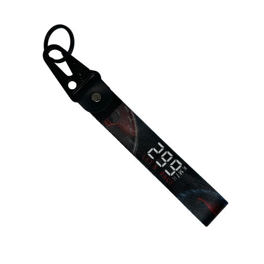 Black 299 KM/H Let’s Race key tag with a speedometer design – Motorev JDM performance car keychain accessory
