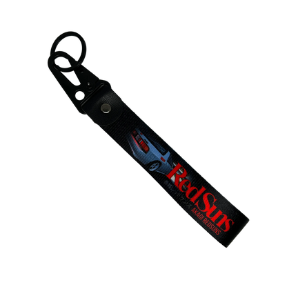Motorev Akagi RedSuns car key tag, a zinc alloy and nylon JDM keyring featuring the iconic Initial D mountain pass racing crew design, scratch resistant and built for JDM and anime car culture enthusiasts UK