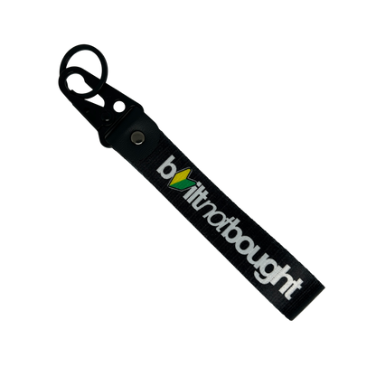 Black Built Not Bought key tag with JDM logo design – Motorev car keychain accessory