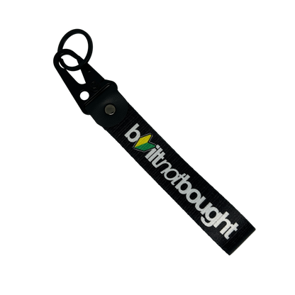 Black Built Not Bought key tag with JDM logo design – Motorev car keychain accessory