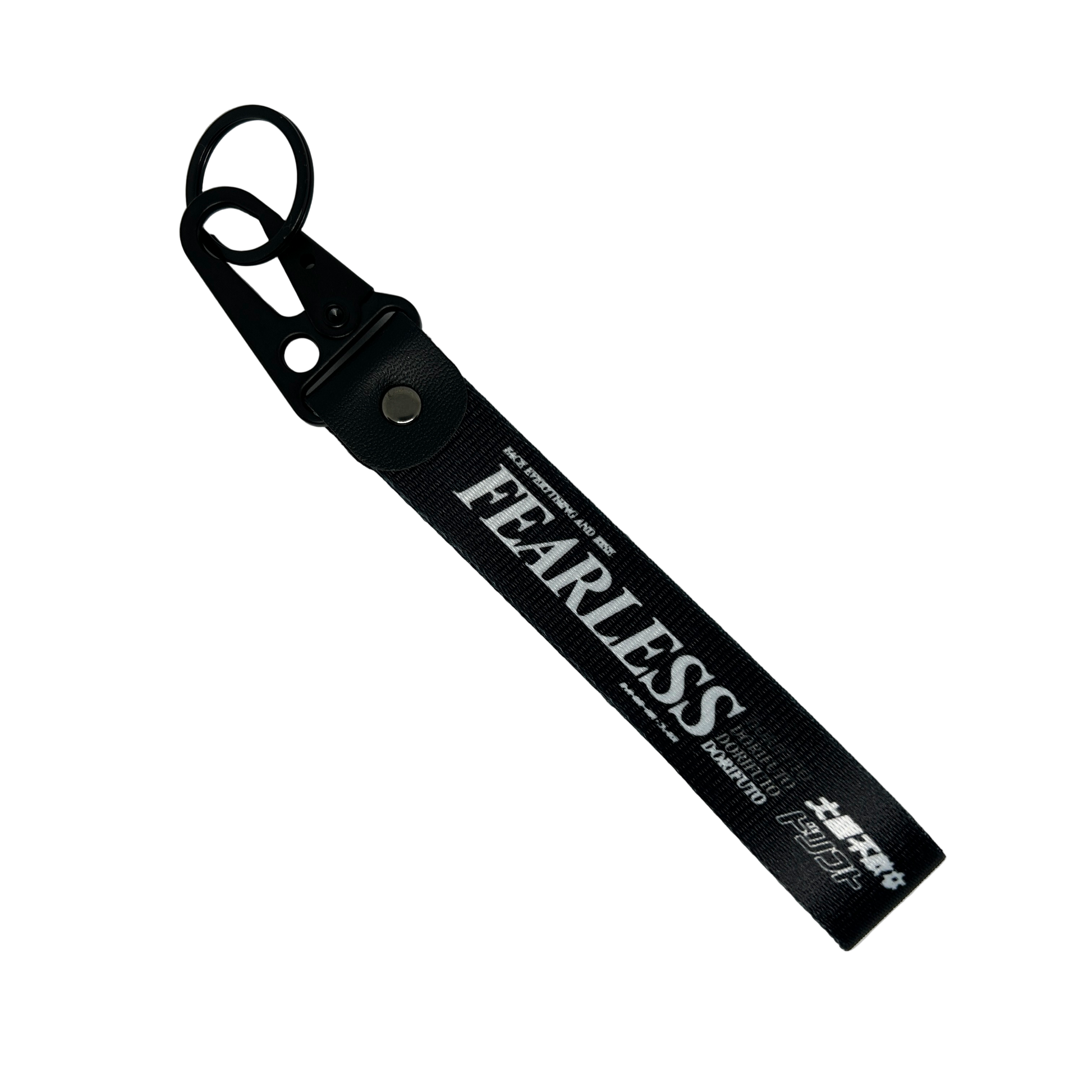 Black Fearless key tag with white text and drift design – Motorev JDM car keychain accessory