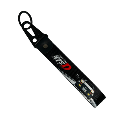 Black key tag with a Toyota AE86 and the Initial D manga logo – Motorev JDM car accessory