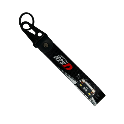 Black key tag with a Toyota AE86 and the Initial D manga logo – Motorev JDM car accessory