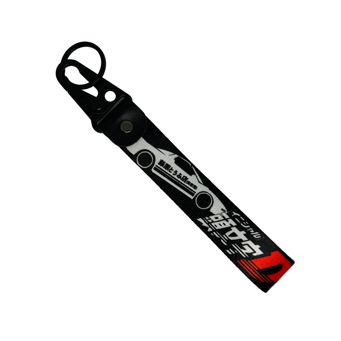 Motorev Initial D AE86 Trueno car key tag, a black wrist strap JDM keyring featuring the iconic Toyota AE86 Trueno silhouette with Japanese kanji and Initial D branding, built for JDM and anime car culture enthusiasts UK