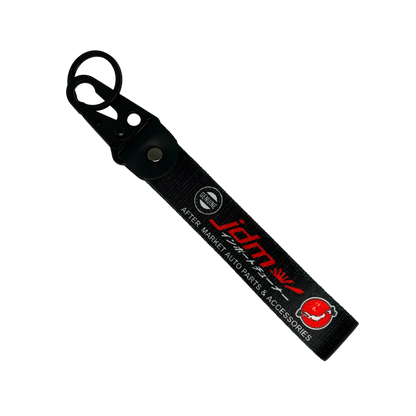 Black JDM Import Tuner key tag with bold performance text – Motorev car keychain accessory