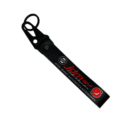 Black JDM Import Tuner key tag with bold performance text – Motorev car keychain accessory