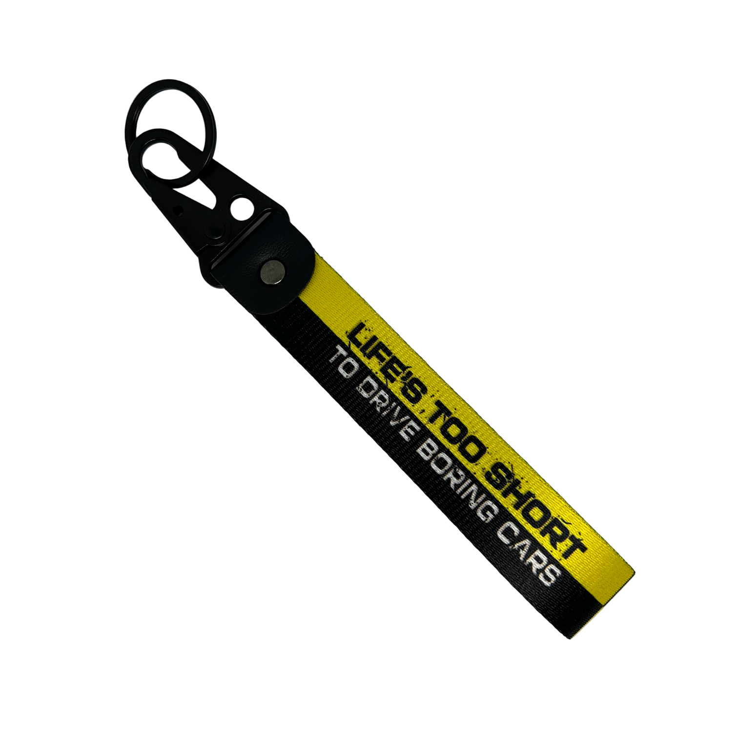Black and yellow key tag with "Life's too short to drive boring cars" text – Motorev JDM car accessory