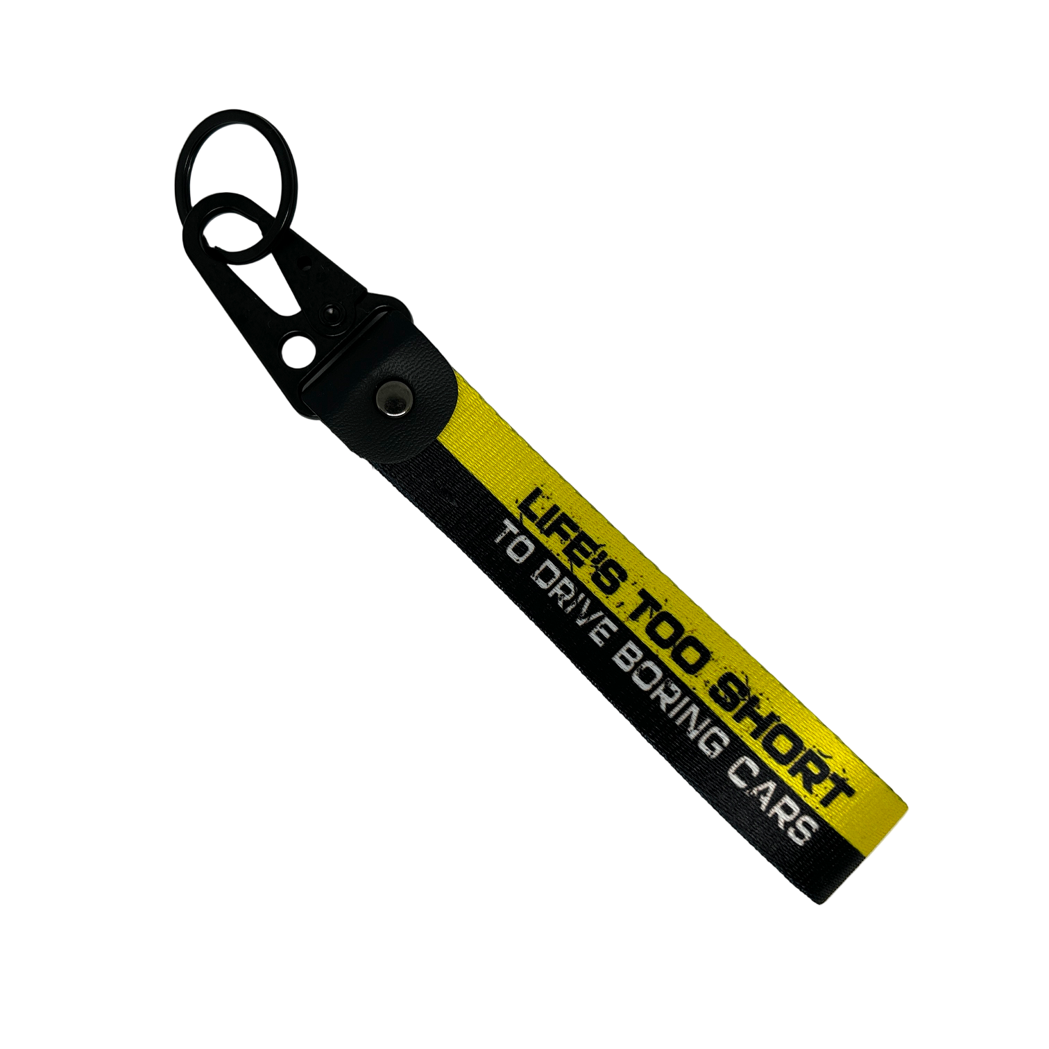 Black and yellow key tag with "Life's too short to drive boring cars" text – Motorev JDM car accessory
