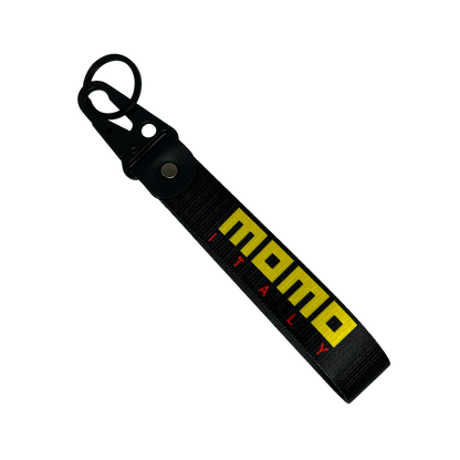 Black key tag with MOMO branding in yellow – Motorev JDM car accessory