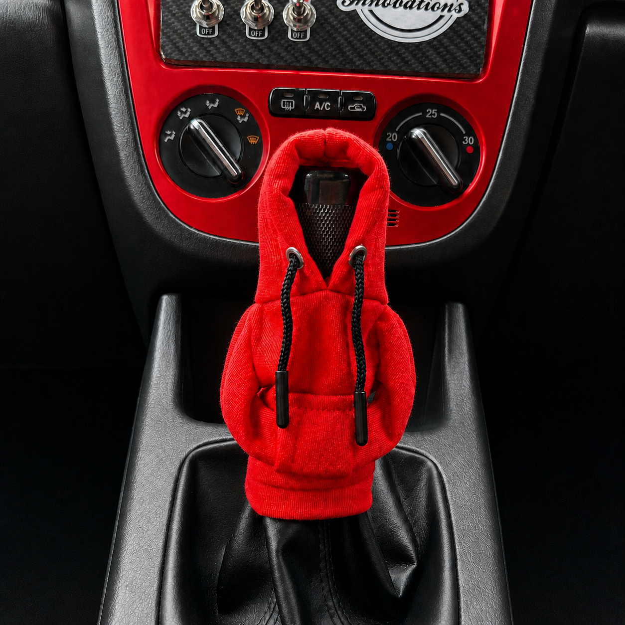 Red gear stick hoodie installed in a Subaru WRX interior – Motorev car interior accessory