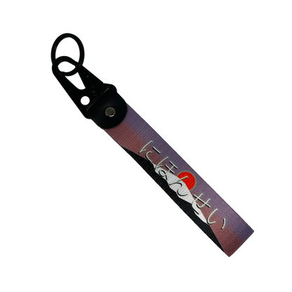 JDM key tag with an image of a mount fuji sunrise and Japanese text – Motorev performance car keychain