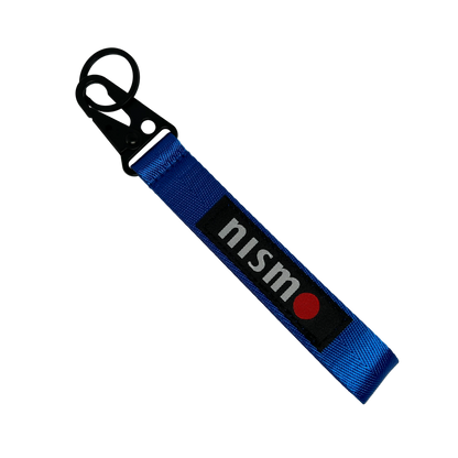 Blue Nismo key tag with performance branding – Motorev JDM car keychain accessory