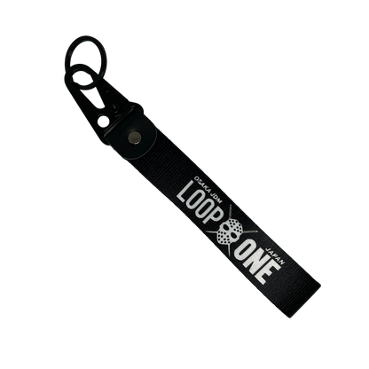 Black key tag featuring "Osaka JDM" and "Loop One" text – Motorev embroidered car keychain