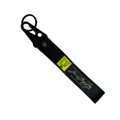 Motorev Osaka Racing Team car key tag, a zinc alloy and nylon JDM keyring featuring a bold street racing crew design, scratch resistant and built for JDM and car culture enthusiasts UK