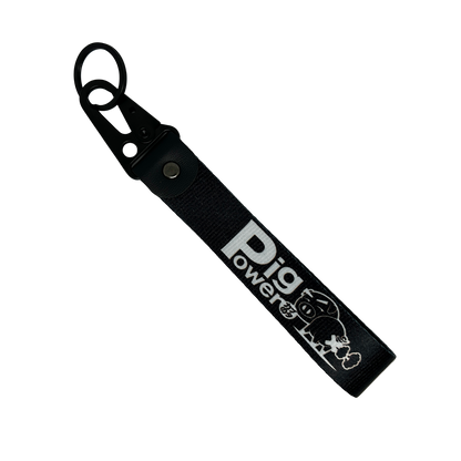 Front side of black JDM key tag with Pig Power branding – MotoRev automotive keychain accessory