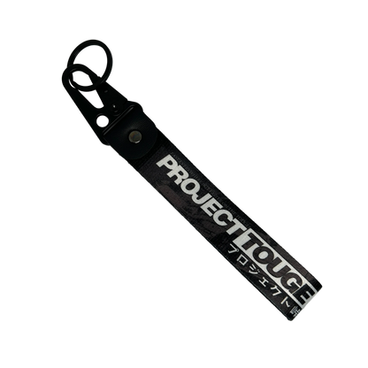 Motorev Project Touge black camo car key tag, a zinc alloy and nylon JDM keyring featuring a bold black camouflage design, scratch resistant and built for touge and motorsport enthusiasts UK