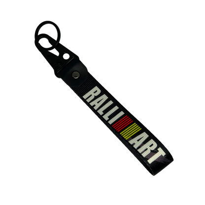 Black key tag with RALLIART branding – Motorev performance keychain for car enthusiasts