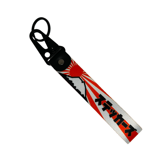 Mount Fuji Rising Sun key tag in orange and white – Motorev automotive keychain