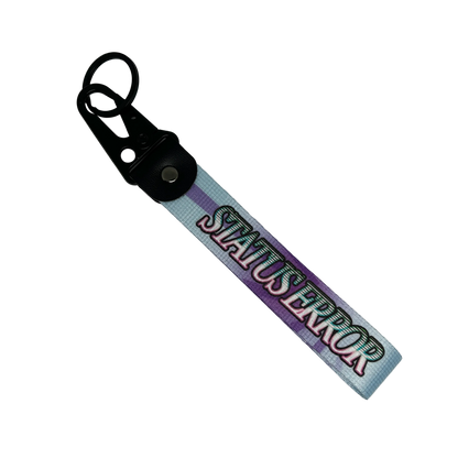Motorev STATUS ERROR Gradient Bloom car key tag, a blue and purple gradient wrist strap keyring featuring bold STATUS ERROR typography, built for car culture and street style enthusiasts UK