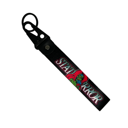 Motorev STATUS ERROR Zombie Girl car key tag, a zinc alloy and nylon keyring featuring a striking zombie girl graphic design, scratch resistant and built for car culture and alternative style enthusiasts UK