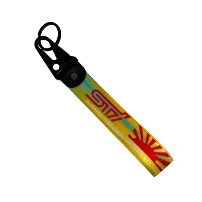 Yellow key tag with the Subaru WRX STI logo and Japanese rising sun – Motorev automotive keychain